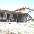 Один этажный дом и А новое здание в общий двор